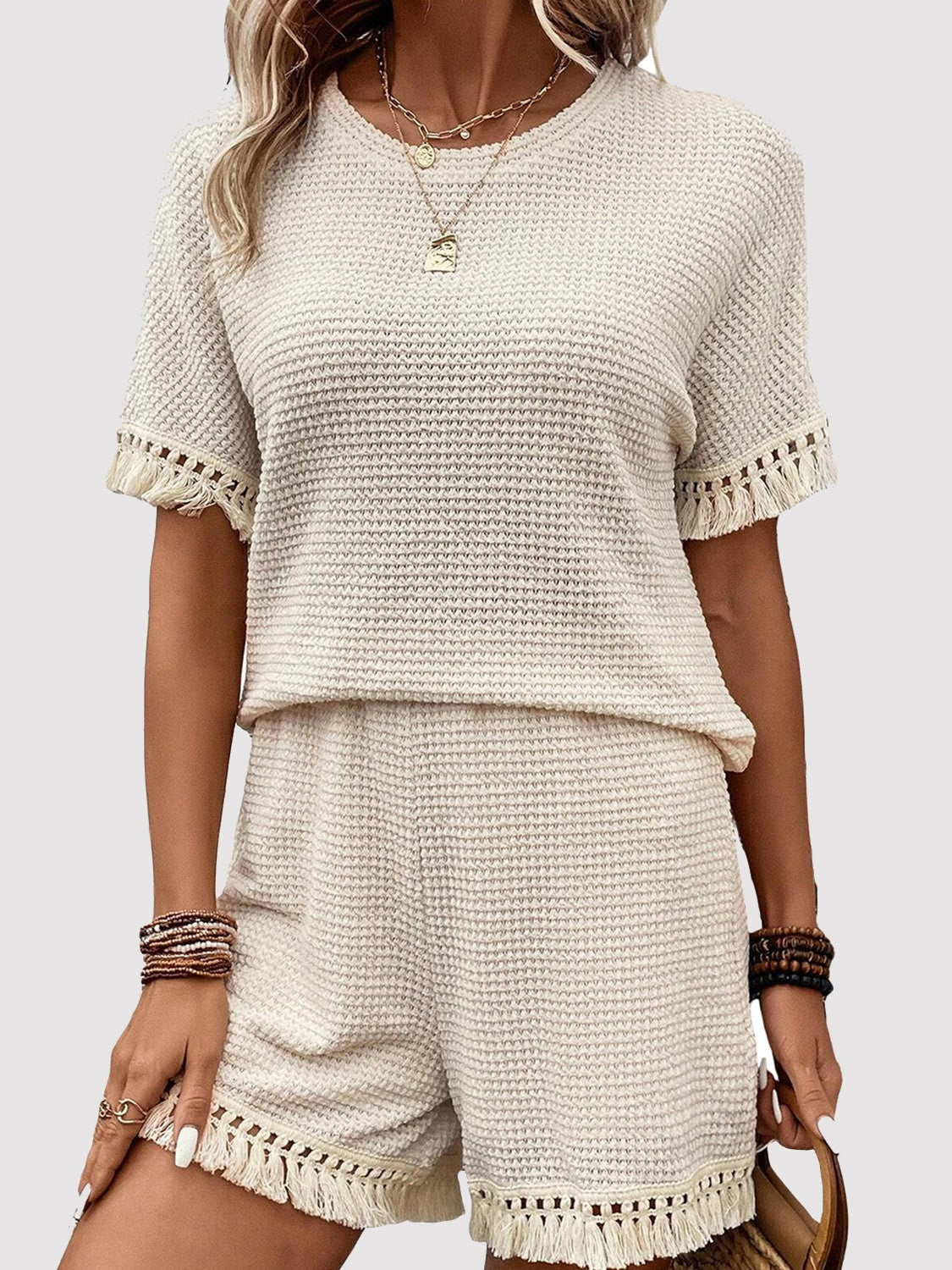 Ensemble haut et short à col rond et pompons