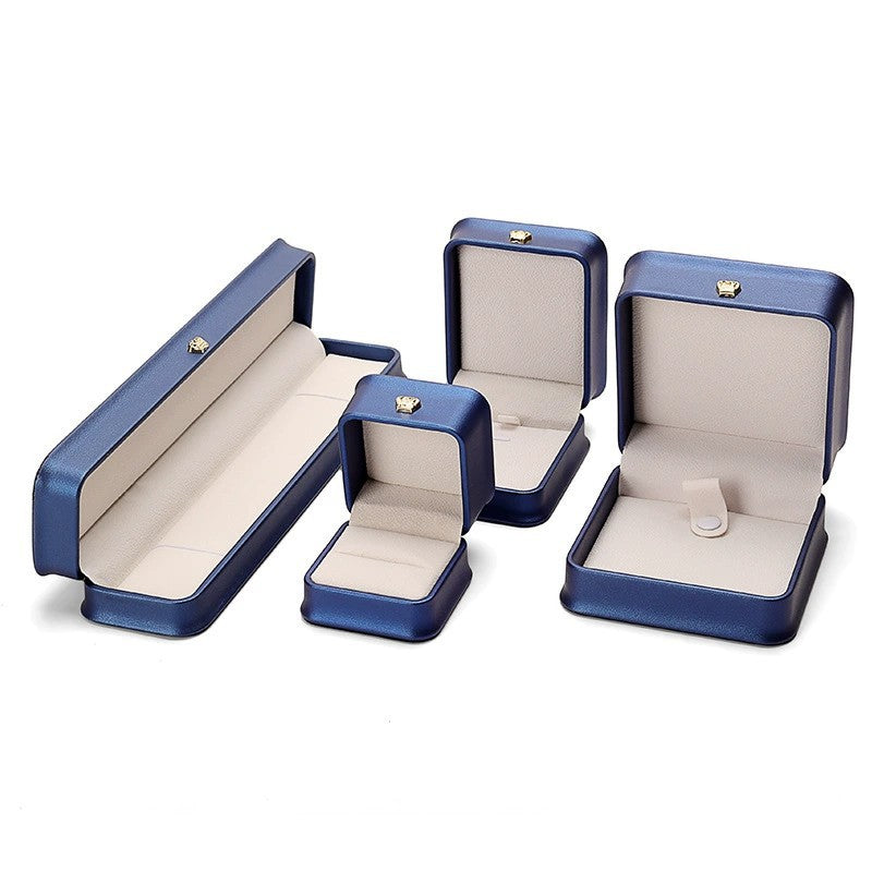Boîte à bijoux en cuir PU avec couronne de serrage à la taille, boîte-cadeau pour bijoux haut de gamme, boîte à bagues