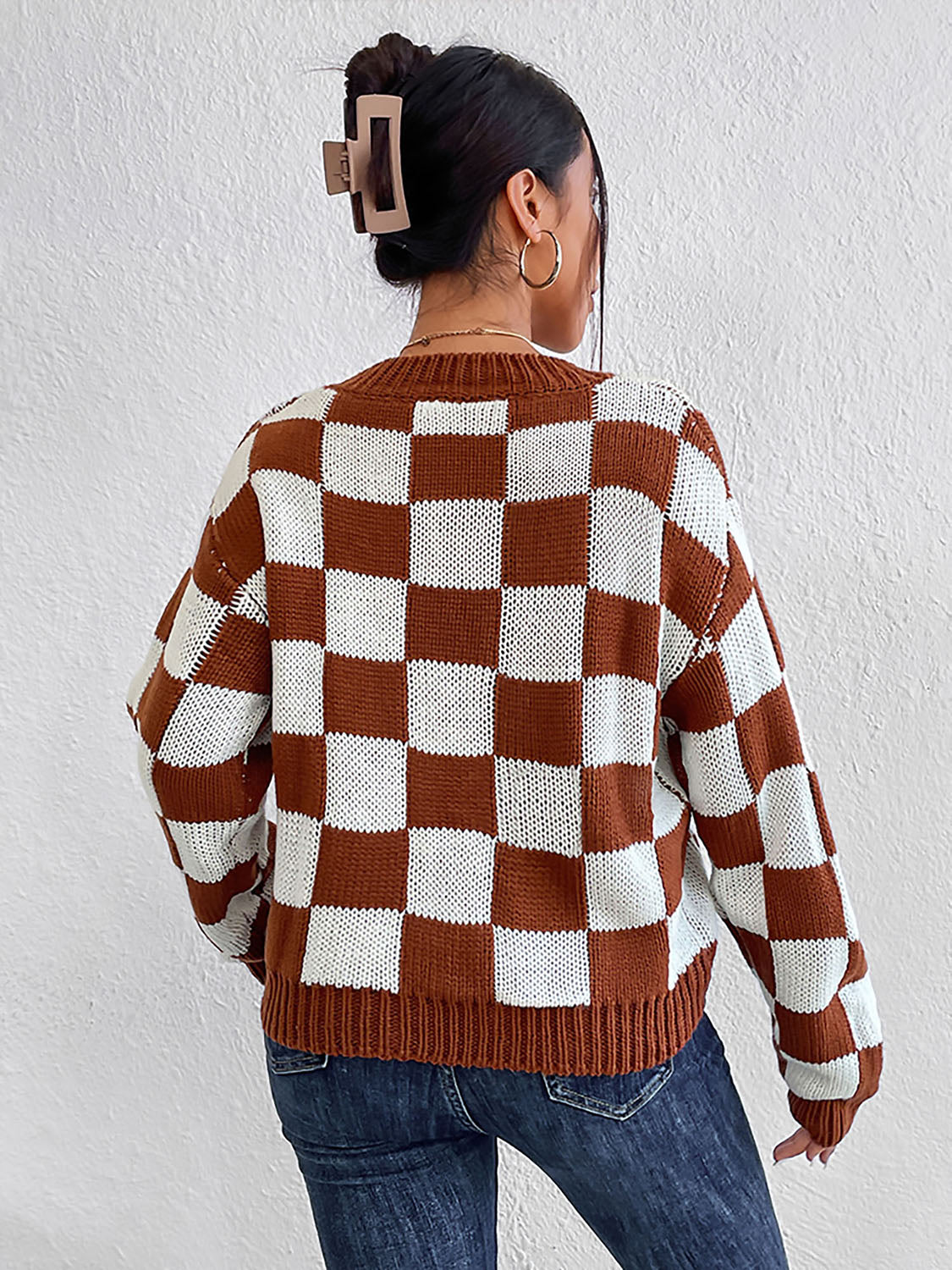 Pull à carreaux col rond