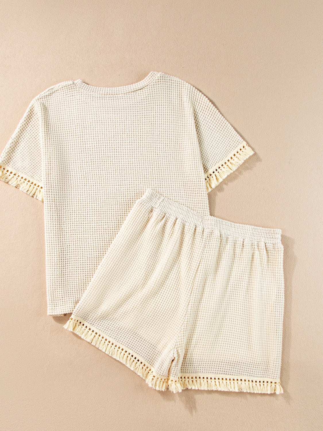 Ensemble haut et short à col rond et pompons