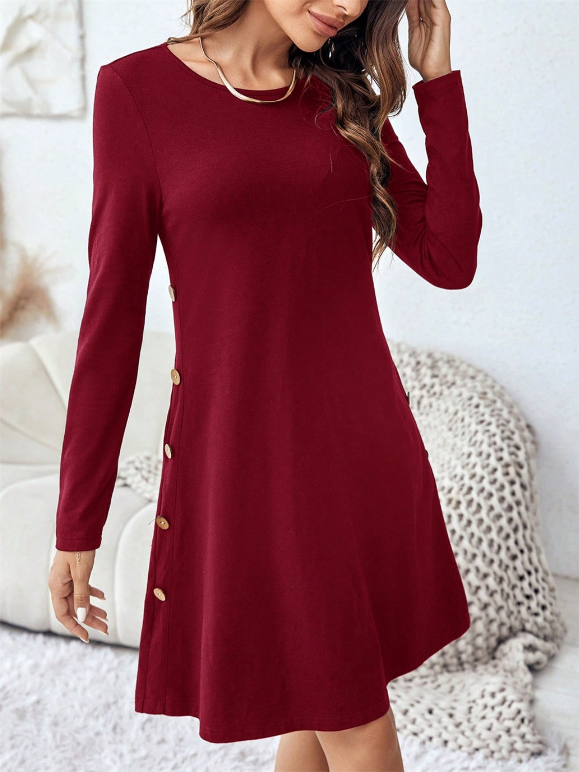 Mini-robe à manches longues et col rond avec poches