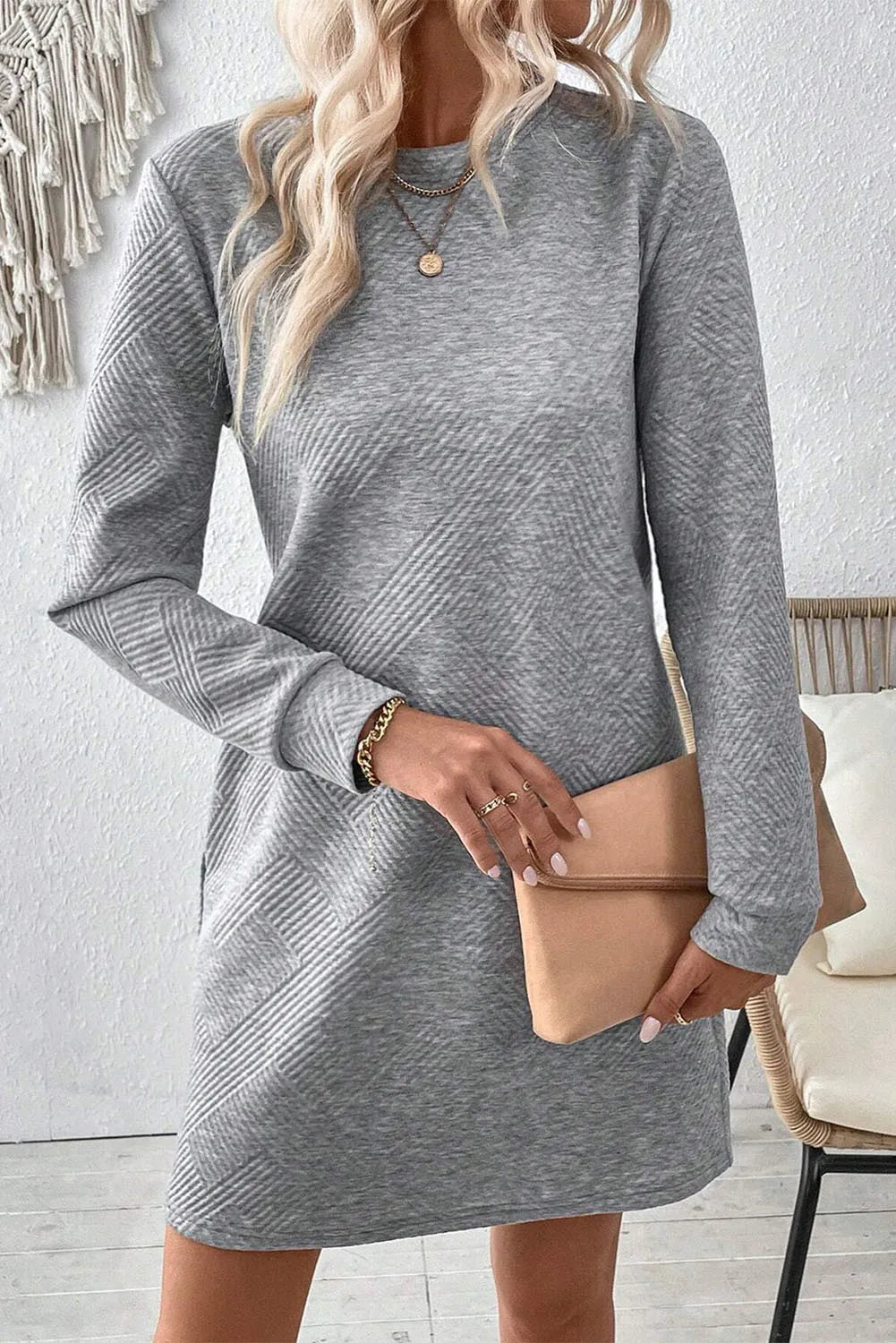 Mini-robe texturée à col rond et manches longues