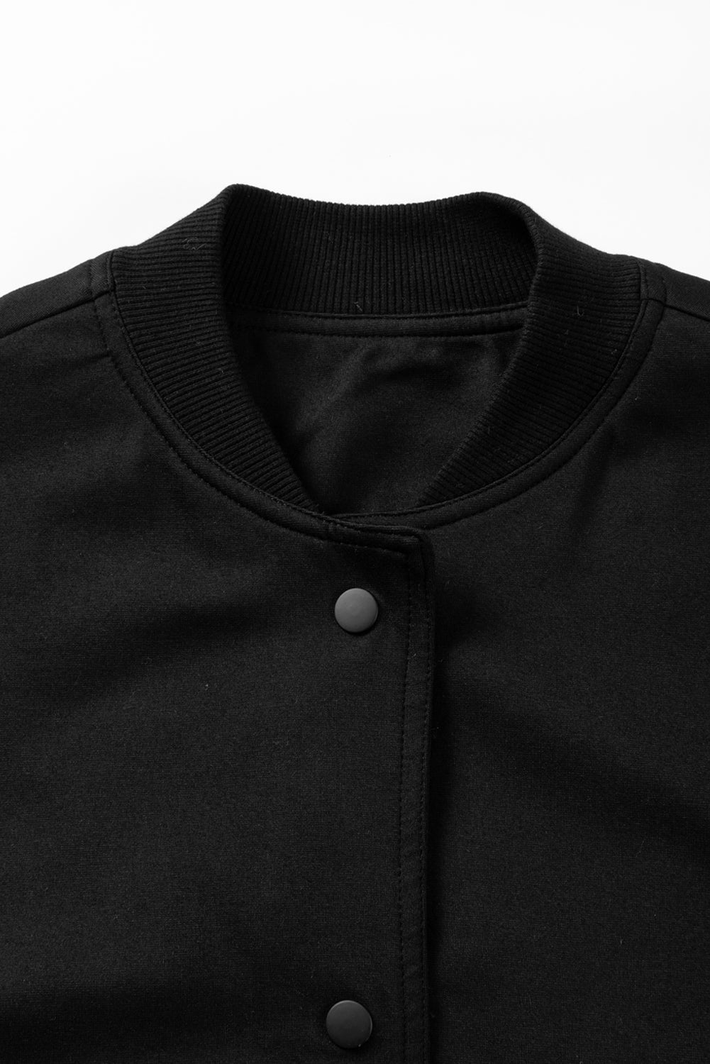 Veste à manches longues avec poches et boutons-pression
