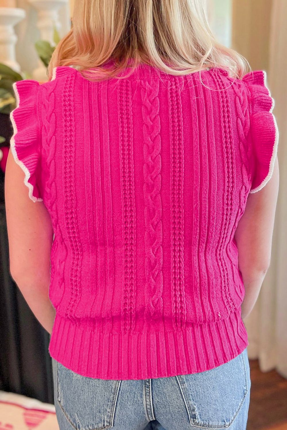 Gilet en tricot torsadé à volants
