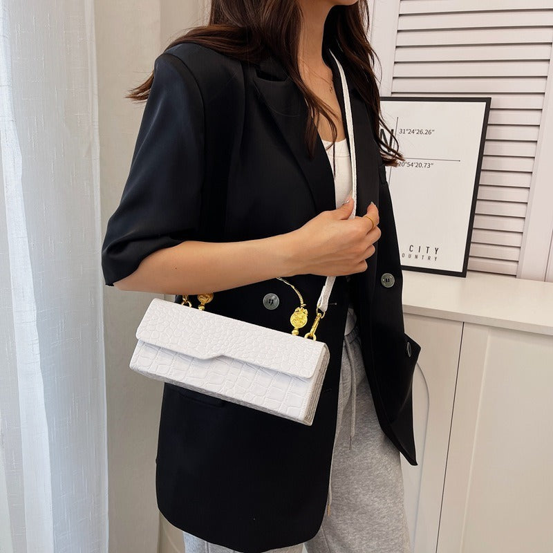 Sac à bandoulière polyvalent en cuir laqué