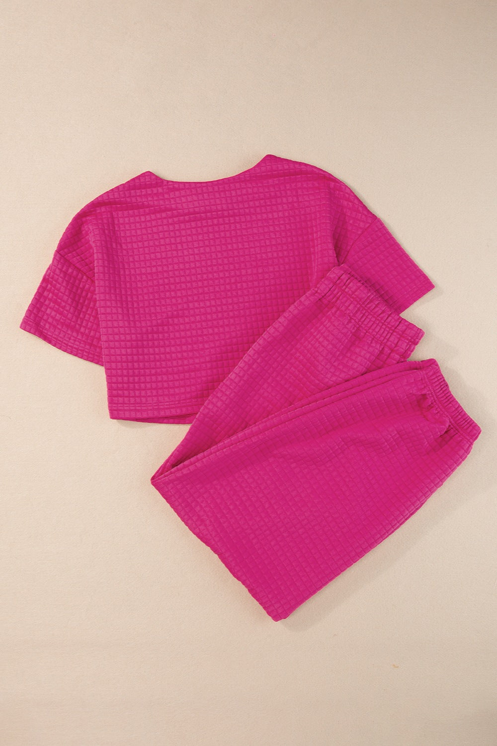 Ensemble haut à manches courtes et col rond et pantalon à taille élastique