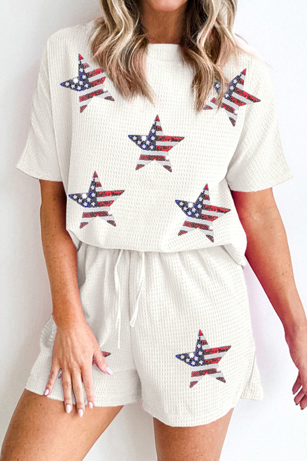 Ensemble haut col rond et short en maille gaufrée à sequins