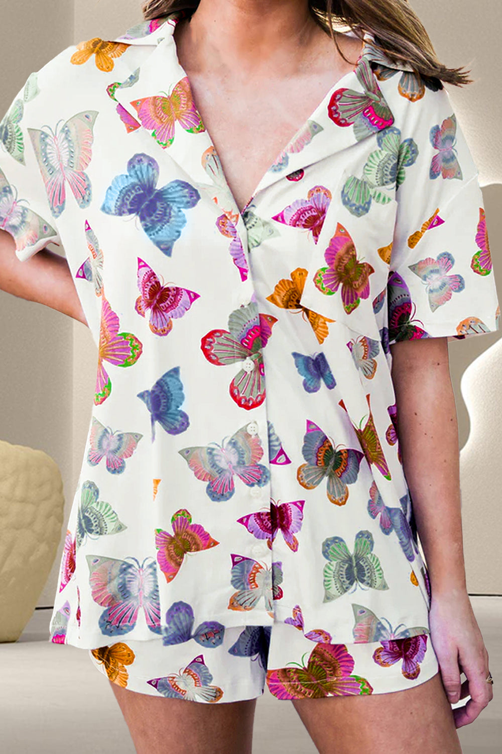 Ensemble haut à manches mi-longues et short papillon