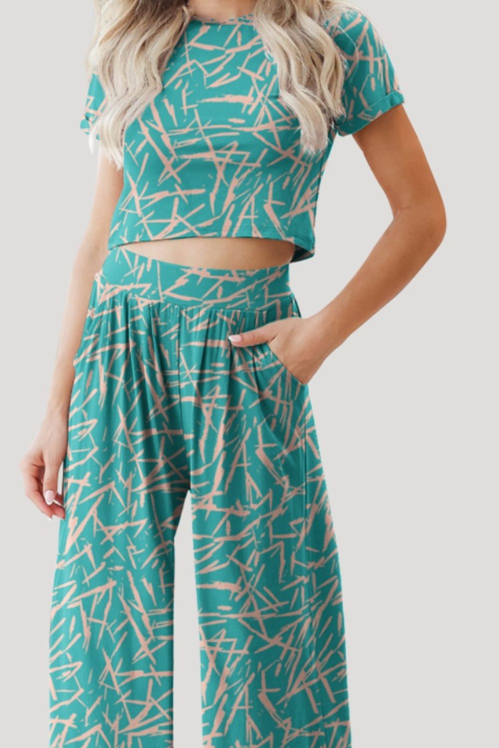 Ensemble haut à manches courtes et pantalon imprimé à col rond