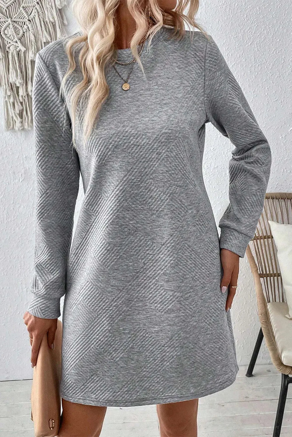 Mini-robe texturée à col rond et manches longues