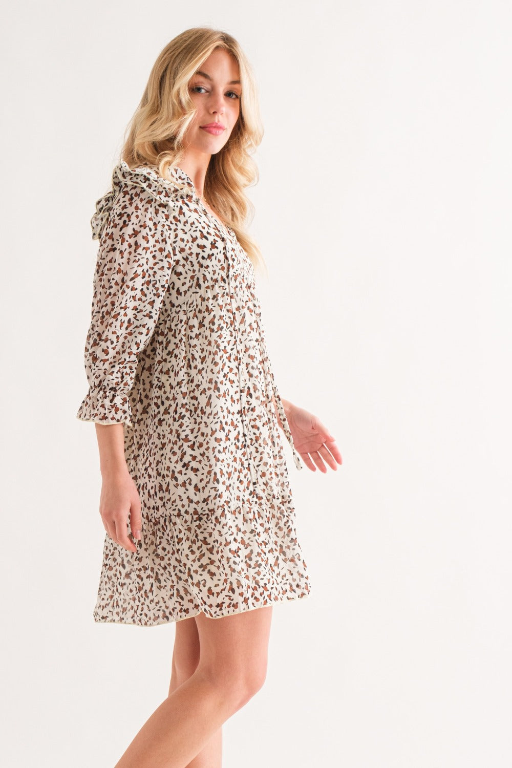 Et la mini-robe tissée à ourlet volanté léopard