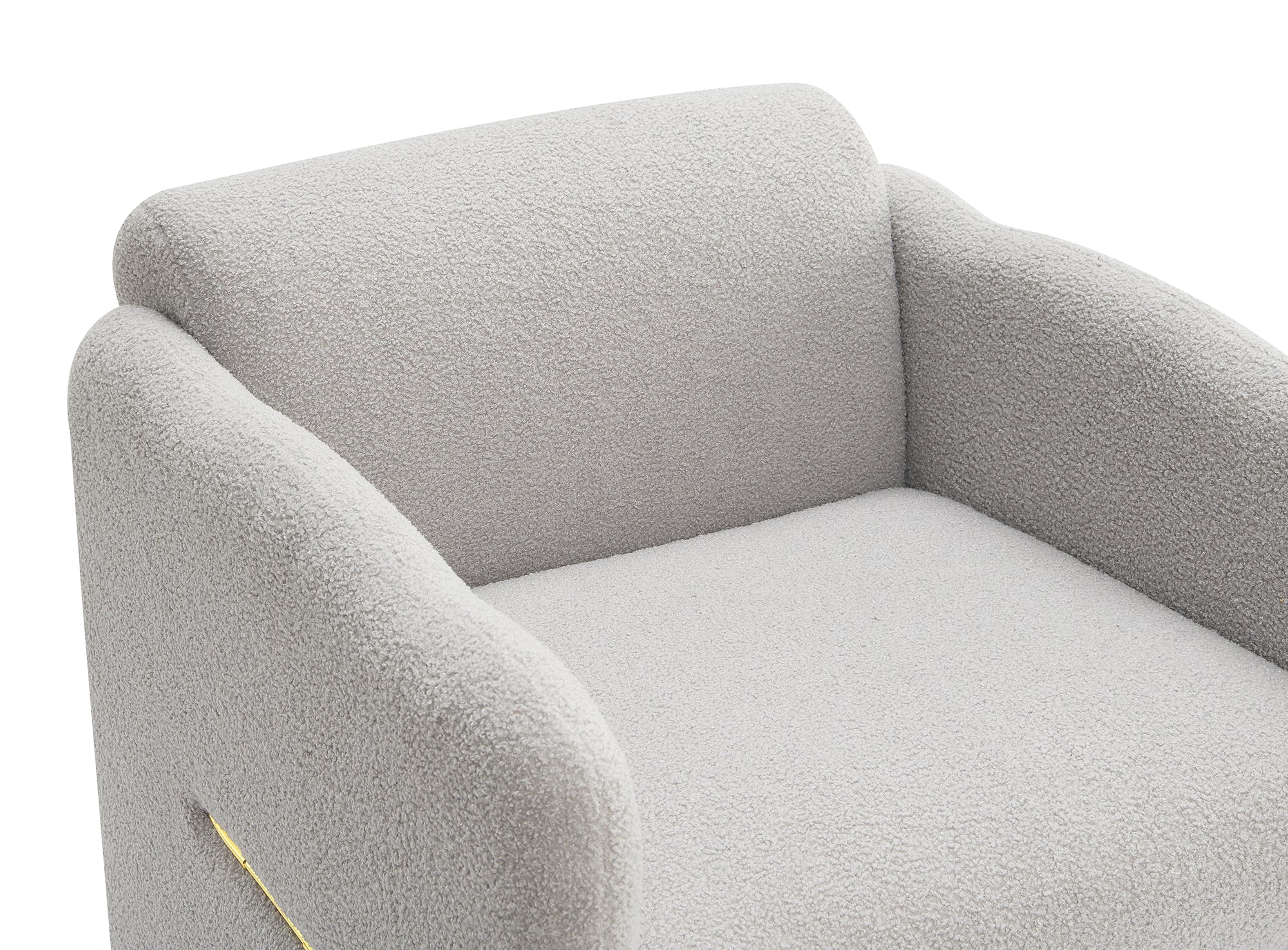 Fauteuil avec accoudoirs ondulés, décorations métalliques de part et d'autre des accoudoirs, en tissu Teddy, gris clair