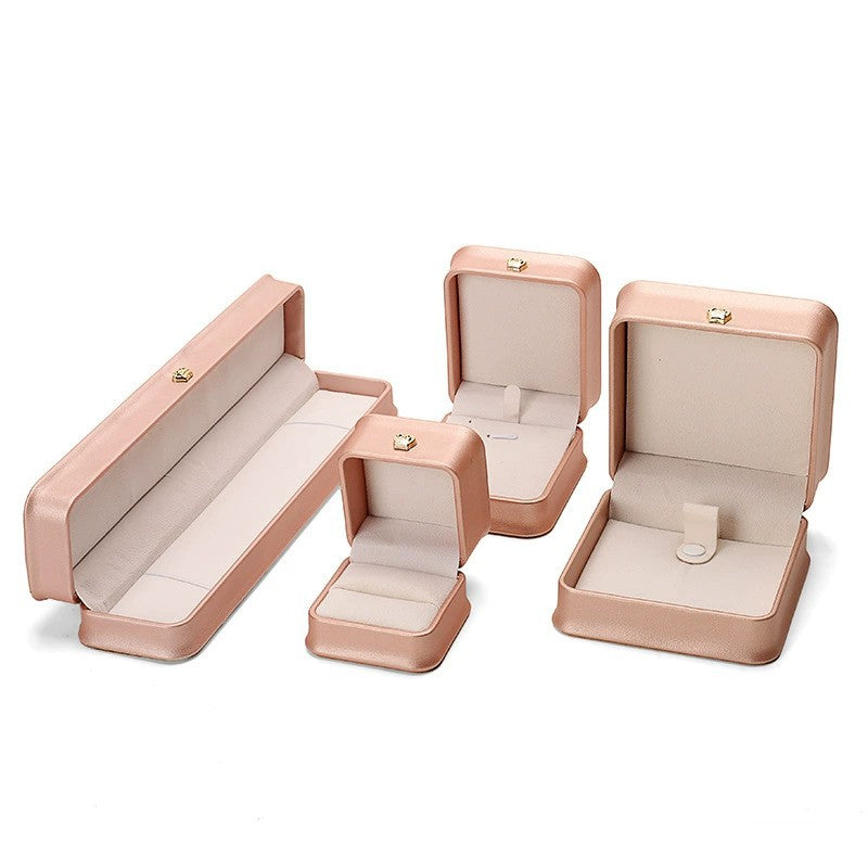 Boîte à bijoux en cuir PU avec couronne de serrage à la taille, boîte-cadeau pour bijoux haut de gamme, boîte à bagues