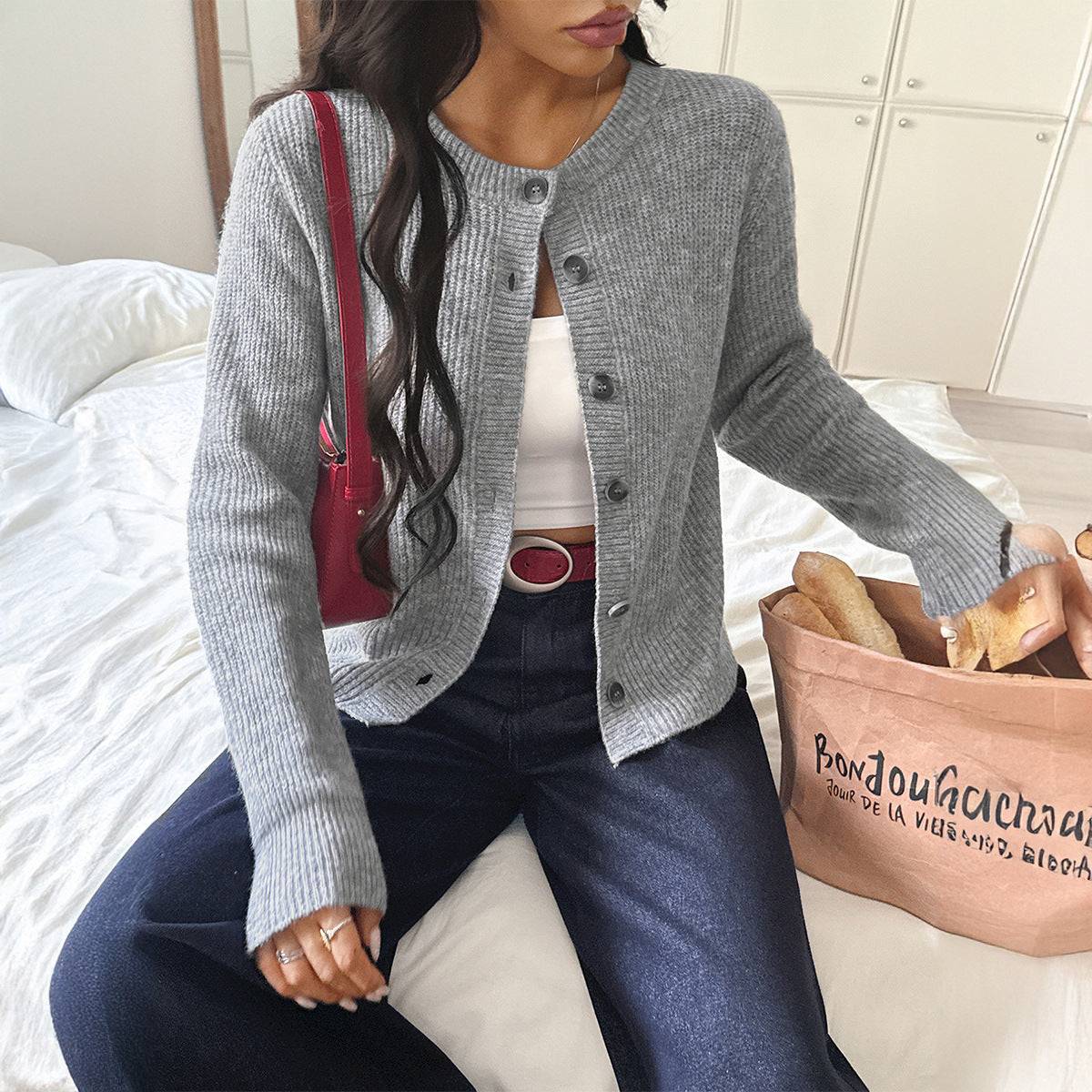 Button solid color long sleeved sweater for women