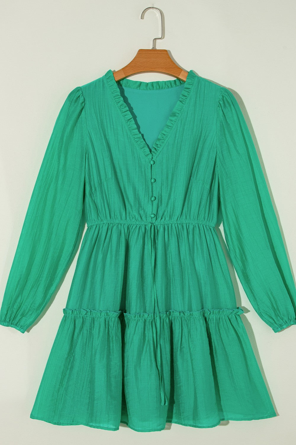 Mini-robe à volants et col en V à manches longues
