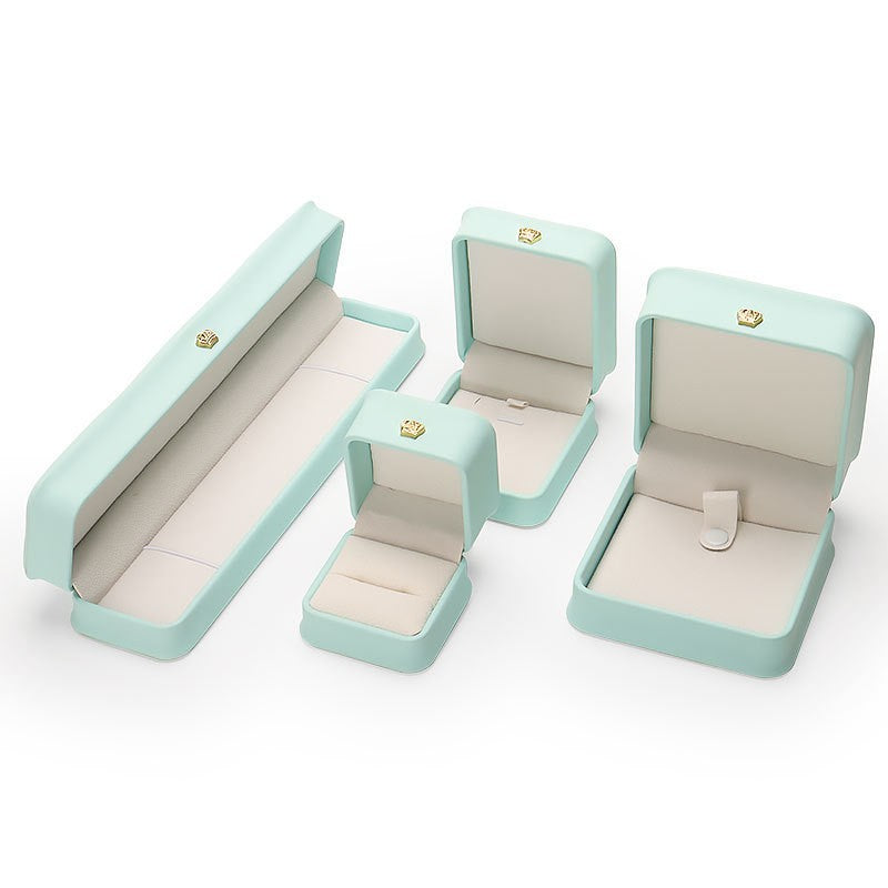 Boîte à bijoux en cuir PU avec couronne de serrage à la taille, boîte-cadeau pour bijoux haut de gamme, boîte à bagues