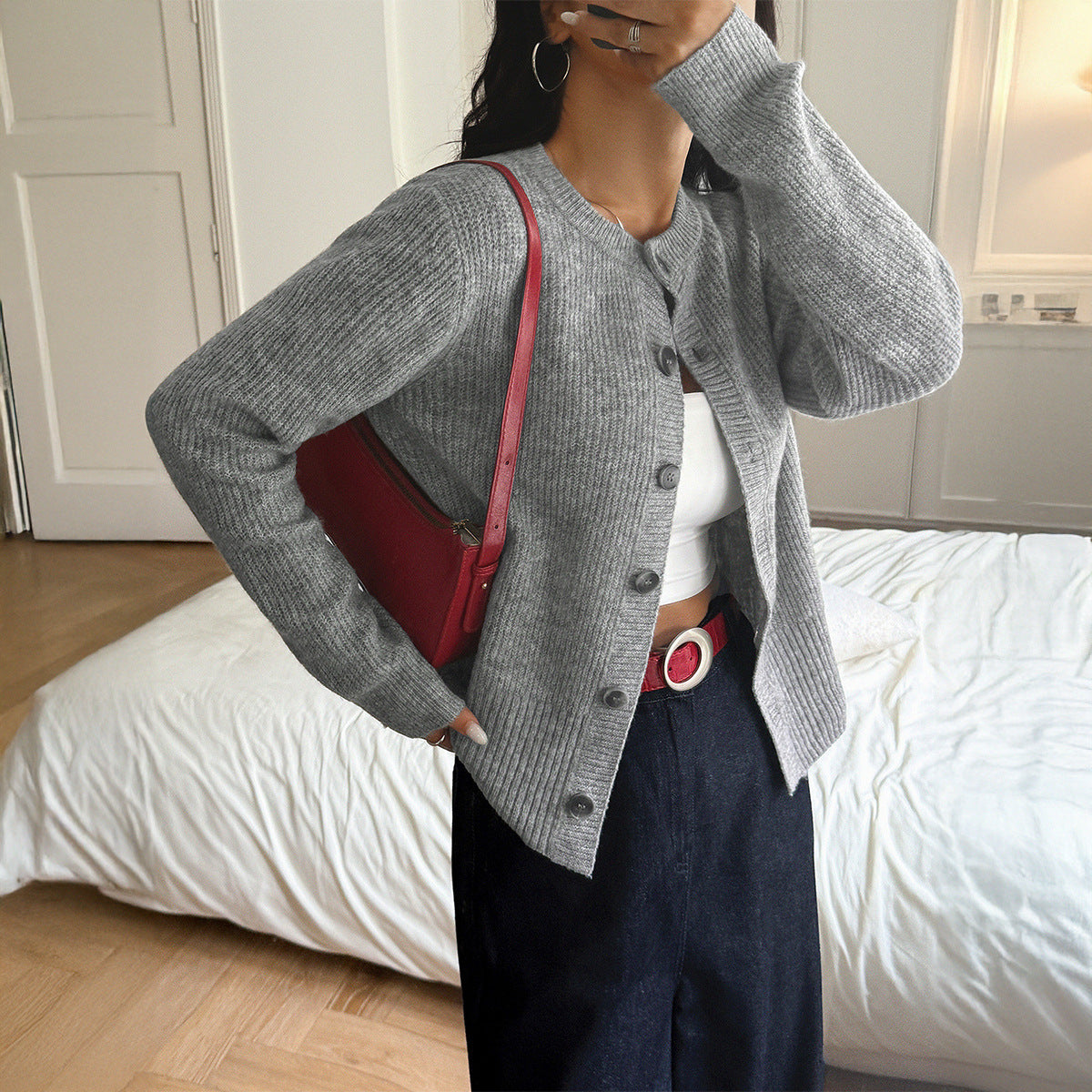 Button solid color long sleeved sweater for women