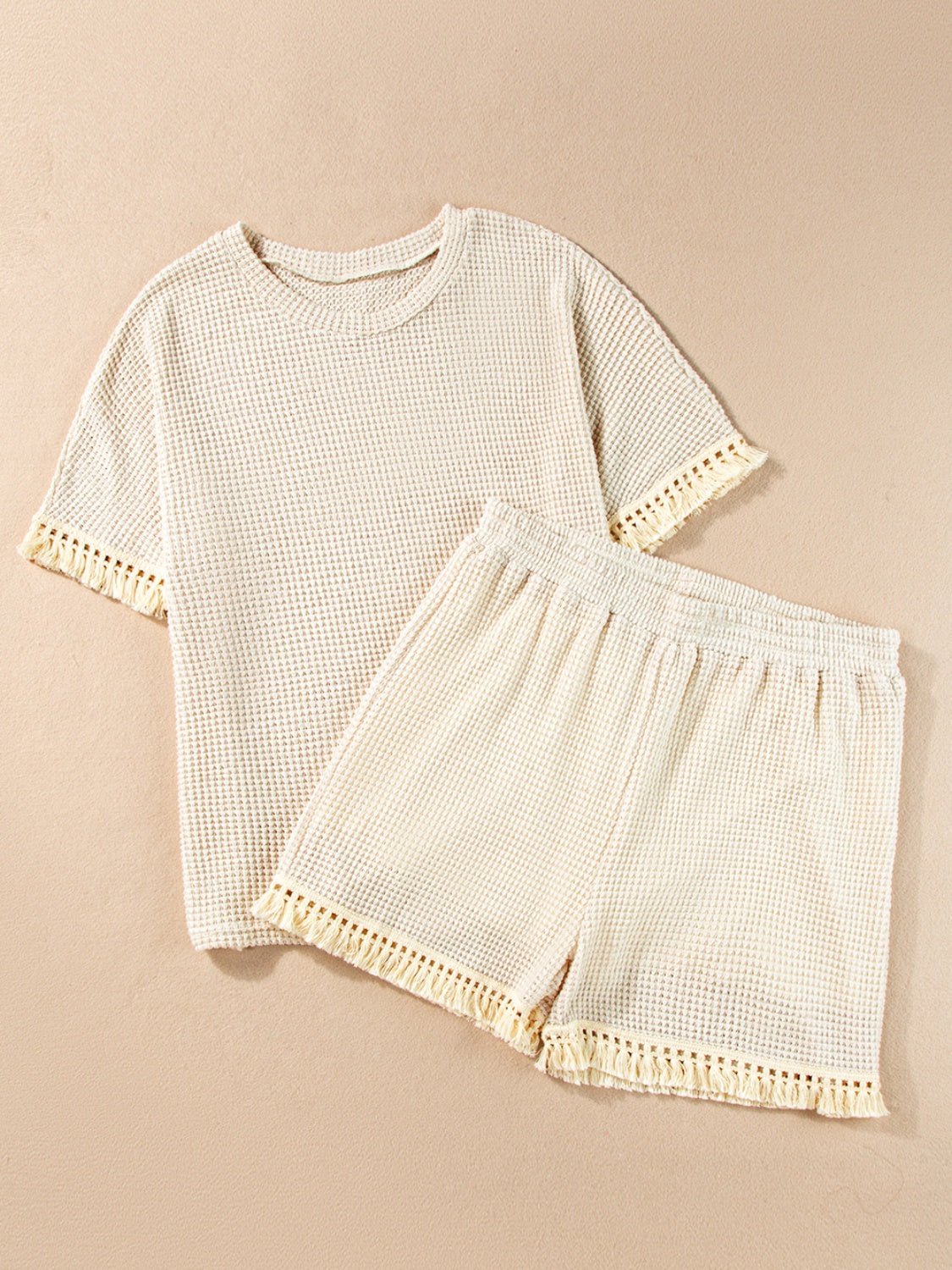 Ensemble haut et short à col rond et pompons