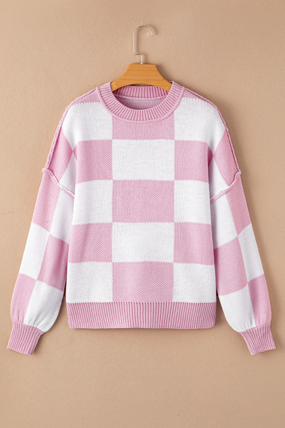 Pull à carreaux avec coutures apparentes et épaules tombantes