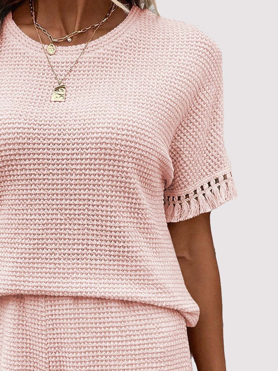 Ensemble haut et short à col rond et pompons