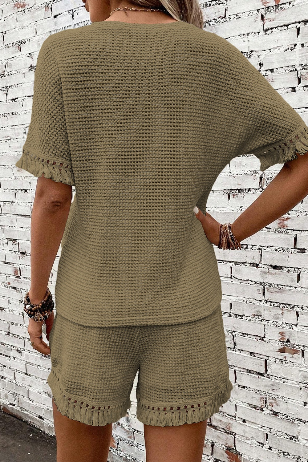 Ensemble haut et short à col rond et pompons
