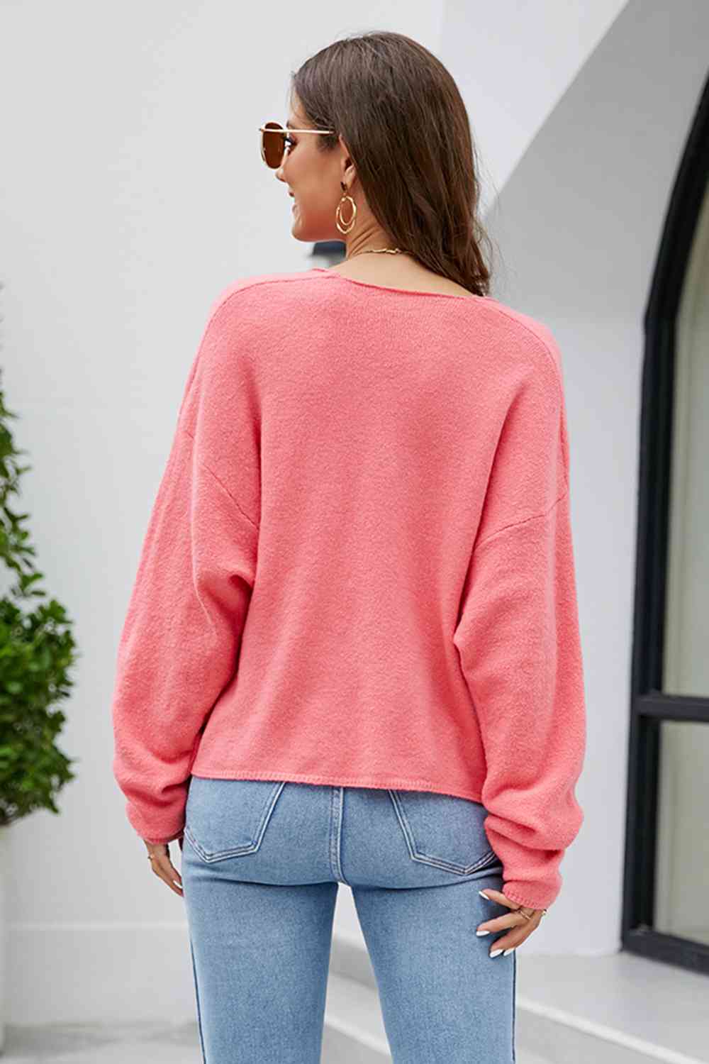 Haut en tricot à manches longues et col en V et épaules tombantes