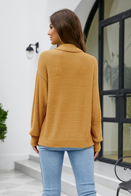 Pull à manches longues et col montant à épaules tombantes