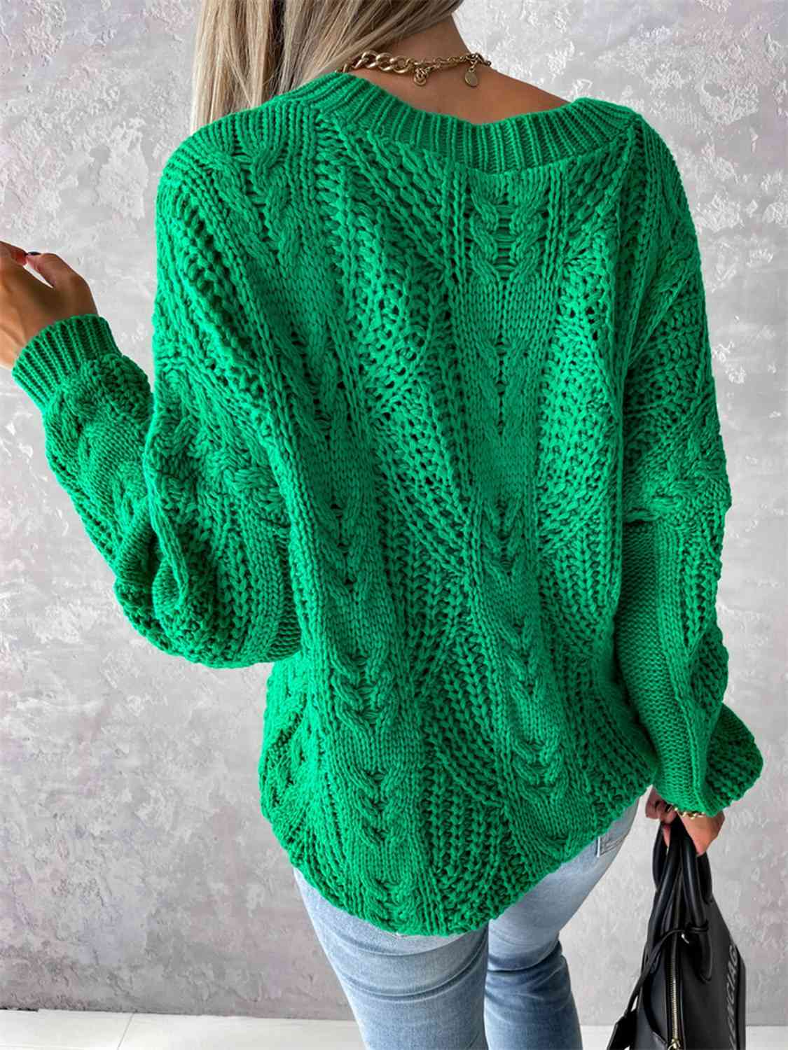 Pull à manches longues en maille torsadée et col en V