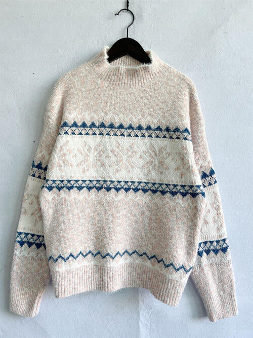 Pull géométrique à col montant et épaules tombantes