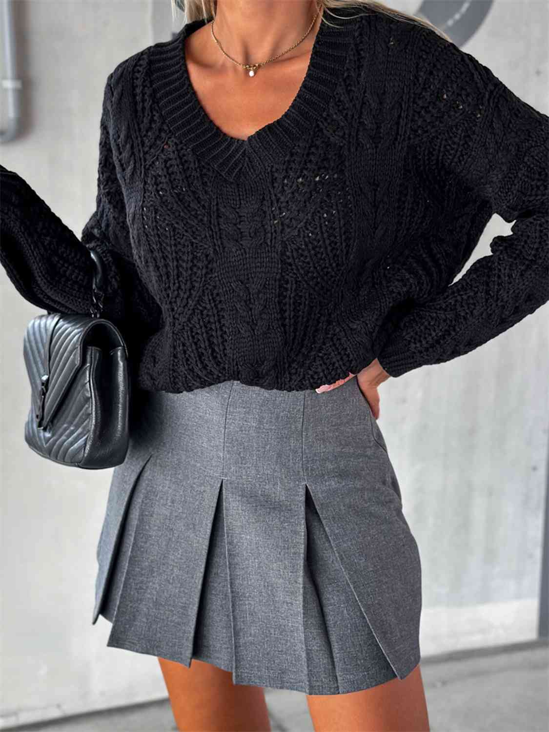 Pull à manches longues en maille torsadée et col en V