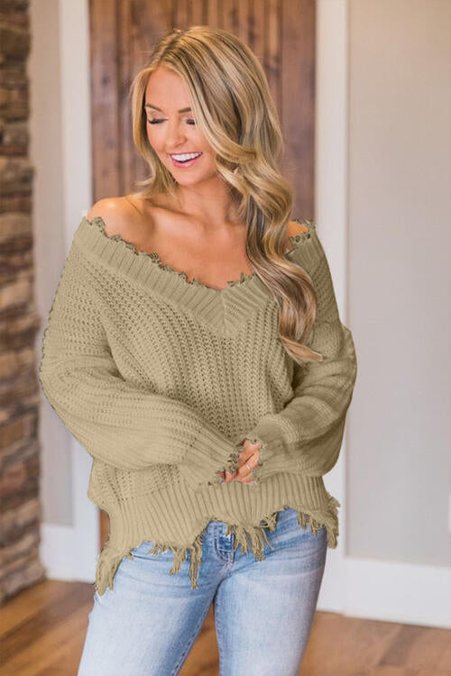 Pull à ourlet effiloché et épaules tombantes