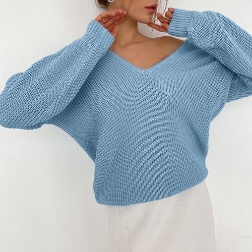 Pull à manches longues et col en V avec épaules tombantes