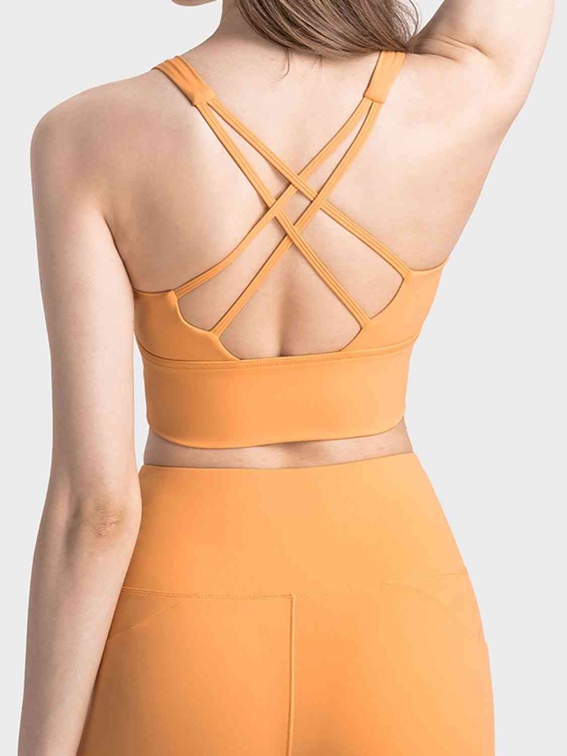 Soutien-gorge de sport à bretelles croisées et col rond