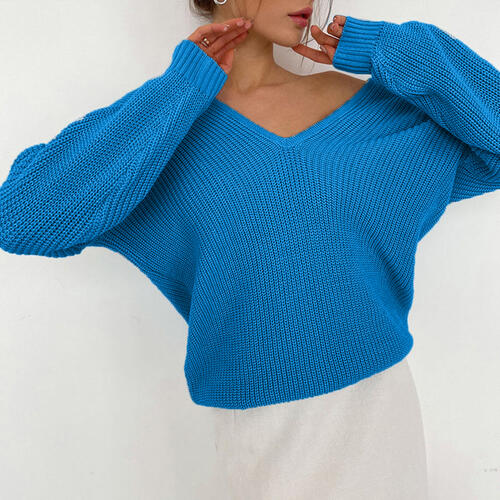 Pull à manches longues et col en V avec épaules tombantes