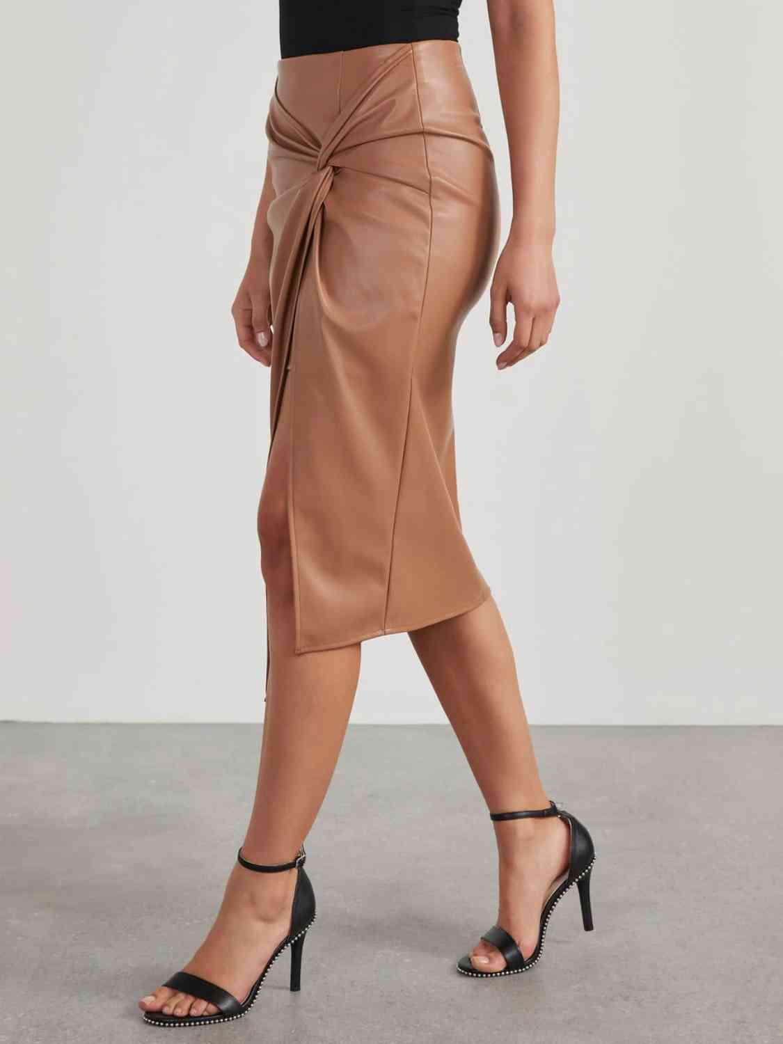 Jupe taille haute à détails torsadés