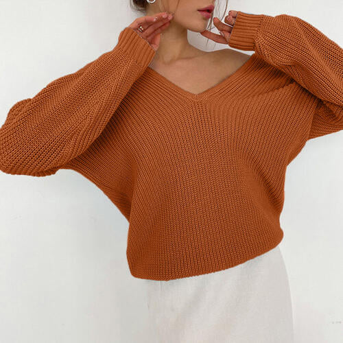 Pull à manches longues et col en V avec épaules tombantes