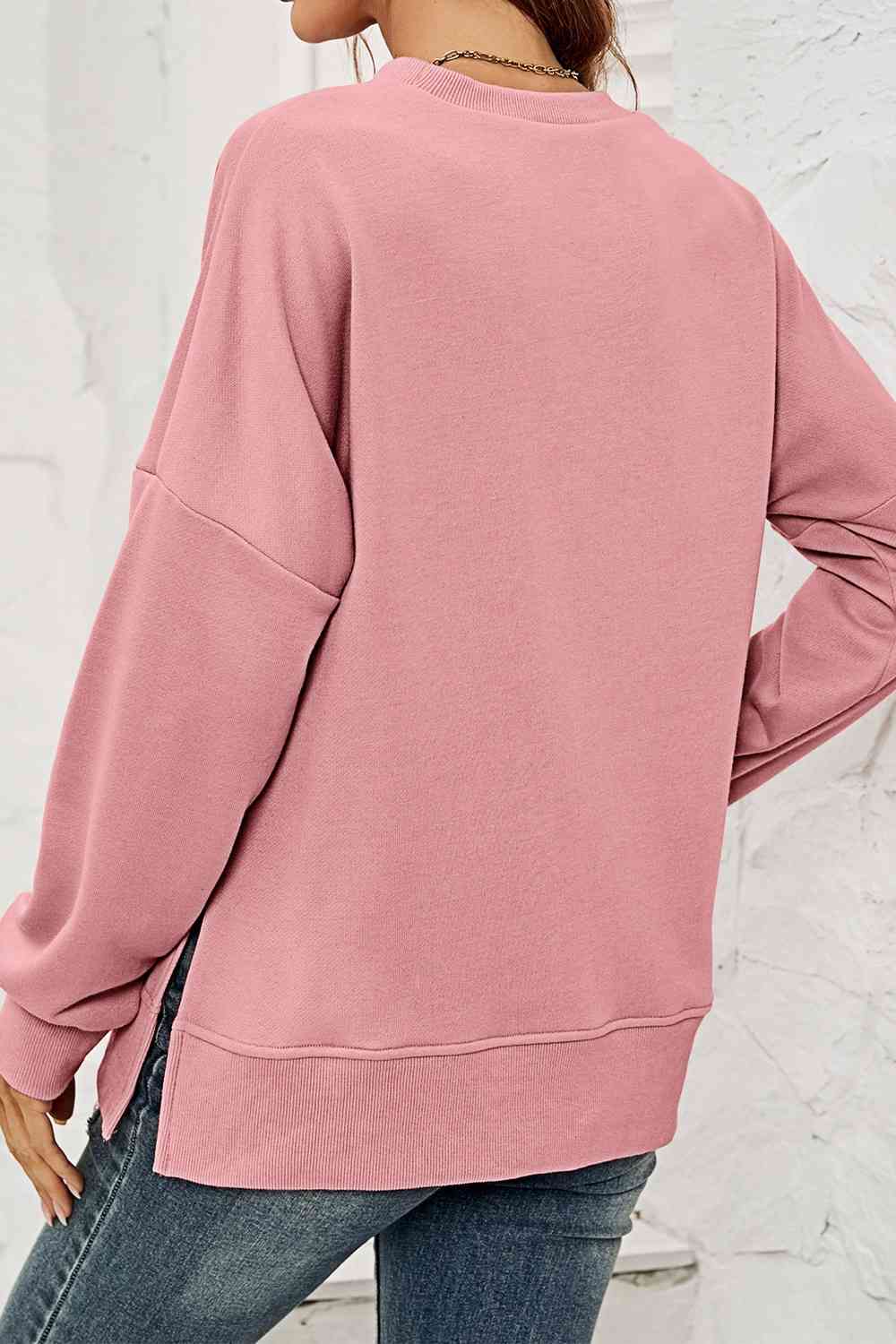 Sweat-shirt fendu à col rond et épaules tombantes