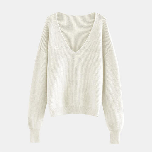 Pull à manches longues et col en V avec épaules tombantes