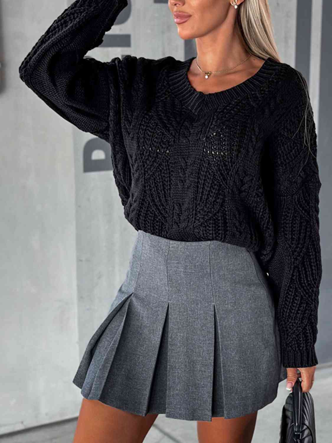 Pull à manches longues en maille torsadée et col en V
