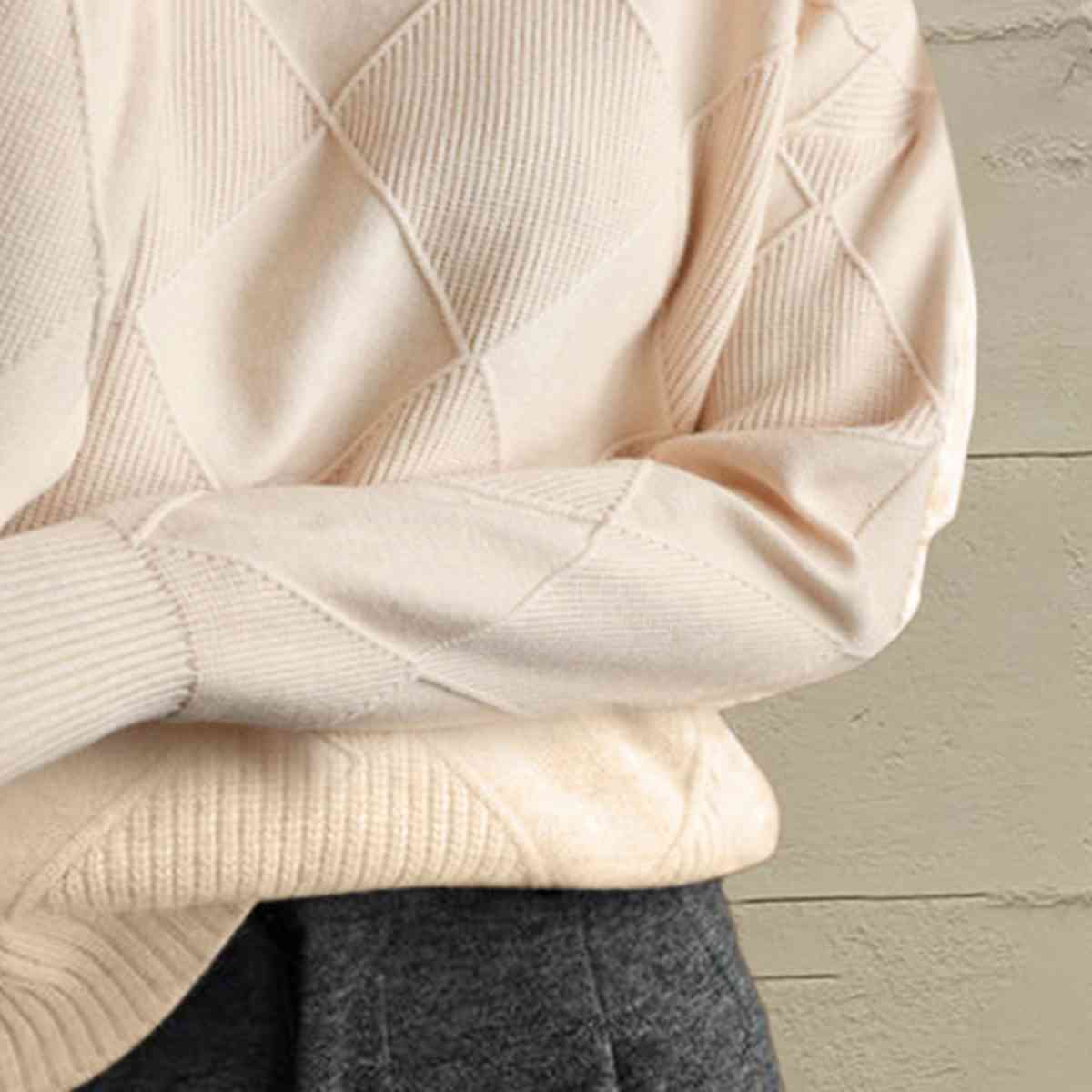 Pull à col roulé géométrique à manches longues