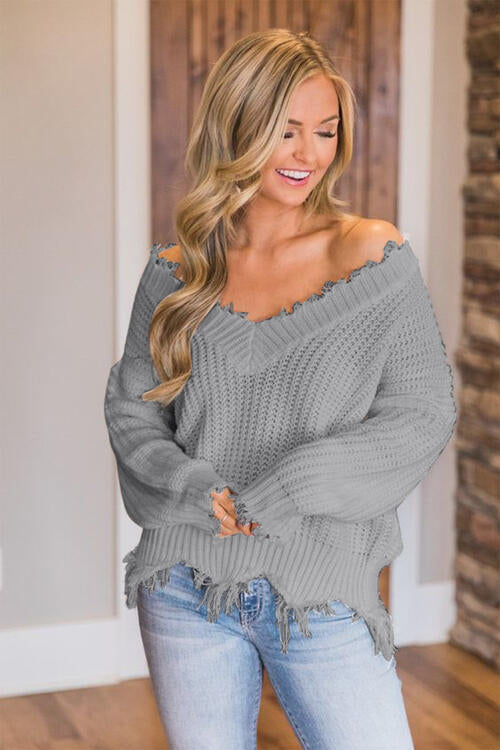 Pull à ourlet effiloché et épaules tombantes