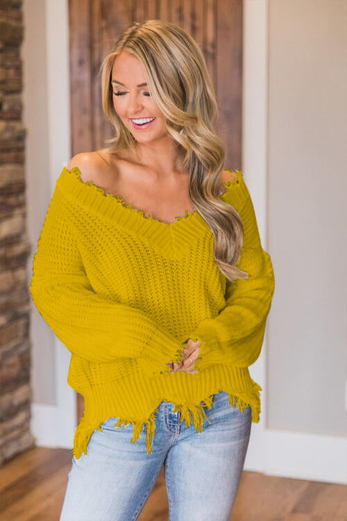 Pull à ourlet effiloché et épaules tombantes