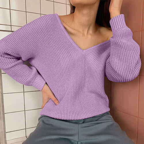 Pull à manches longues et col en V avec épaules tombantes
