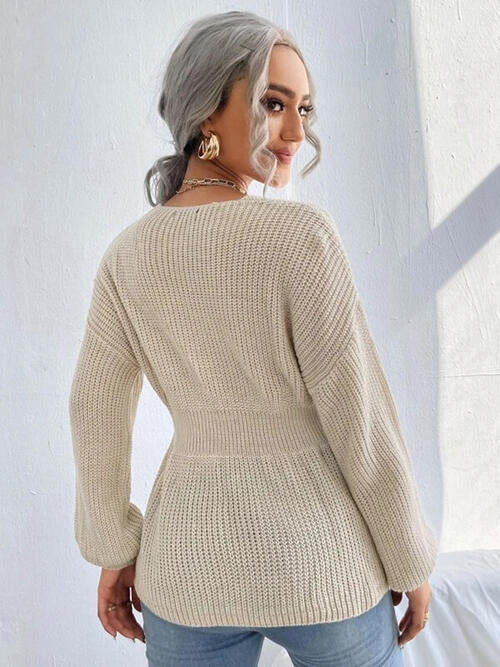 Haut en tricot à épaules tombantes crantées