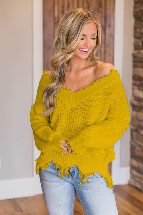 Pull à ourlet effiloché et épaules tombantes