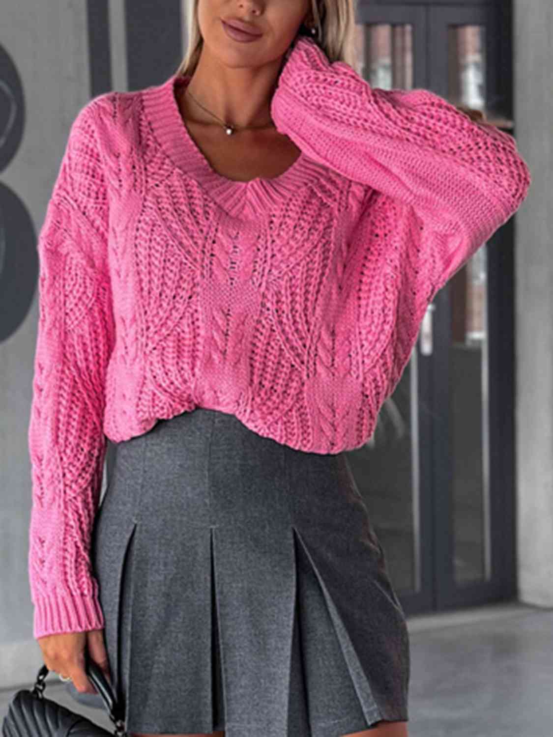 Pull à manches longues en maille torsadée et col en V