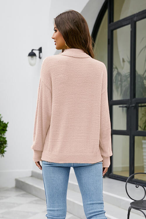 Pull à manches longues et col montant à épaules tombantes