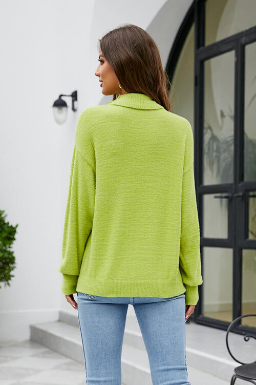 Pull à manches longues et col montant à épaules tombantes