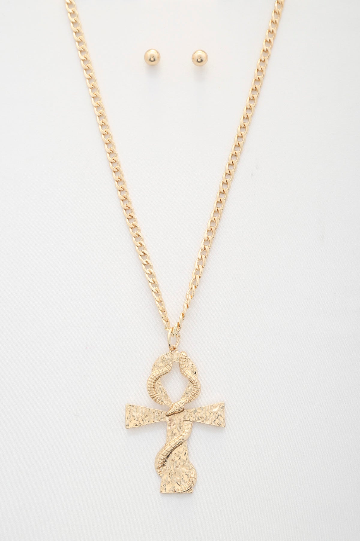 Collier à maillons gourmettes avec pendentif en forme de croix serpent