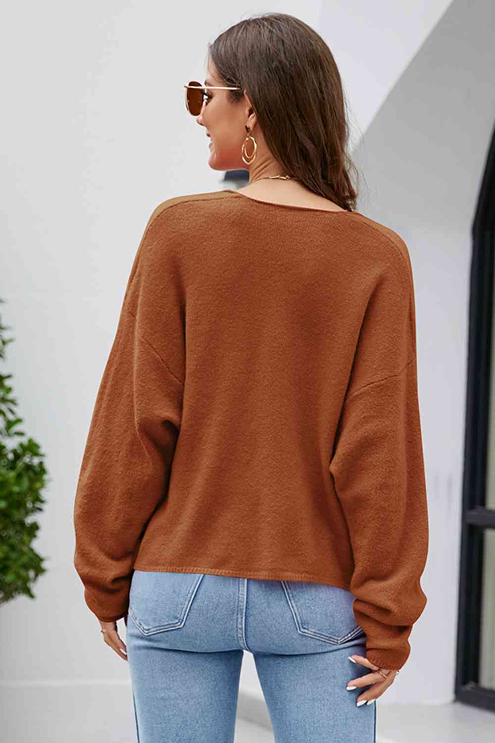 Haut en tricot à manches longues et col en V et épaules tombantes